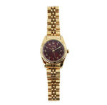 Vue de face montre femme Emir Watches cadran rubis soleillé chiffres arabes et boîtier or rose